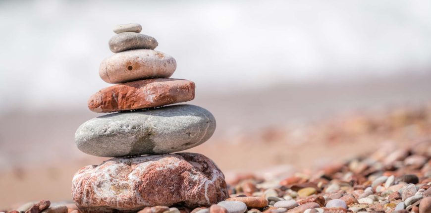 zen-balanced-small-pile-of-stacked-stones-GR5MQKW.jpg